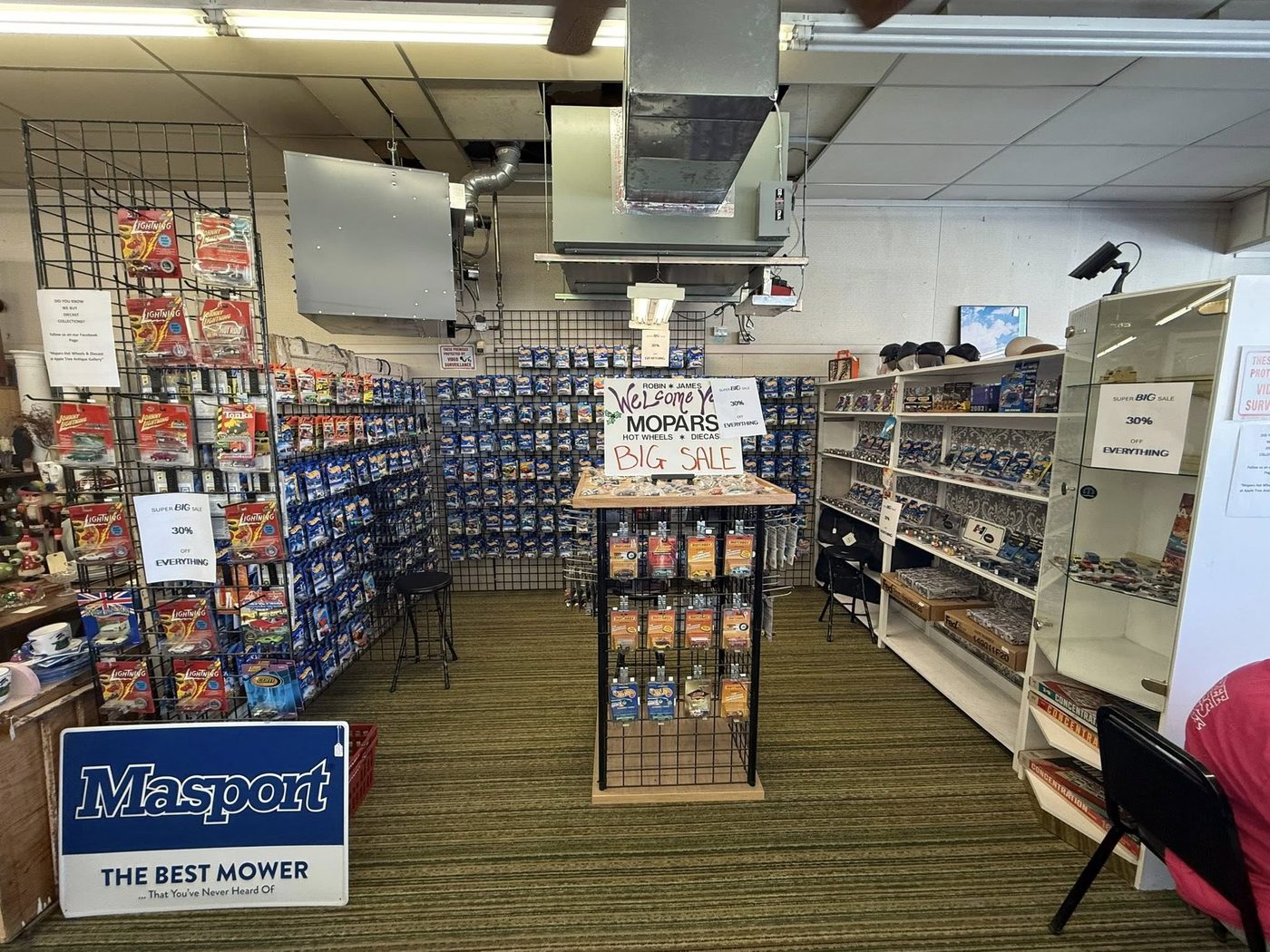 Mopars diecast booth with carded Hot Wheels inside Apple Tree Antique Gallery